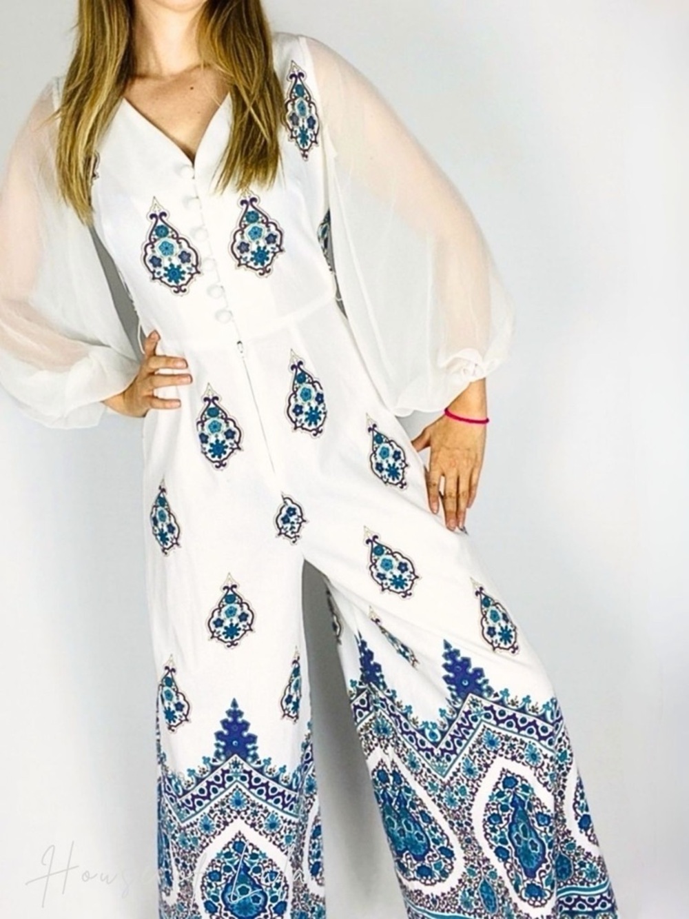 Vintage designer EUC boho white Jumpsuit. Gypsy 70s wide leg balloon sleeve.